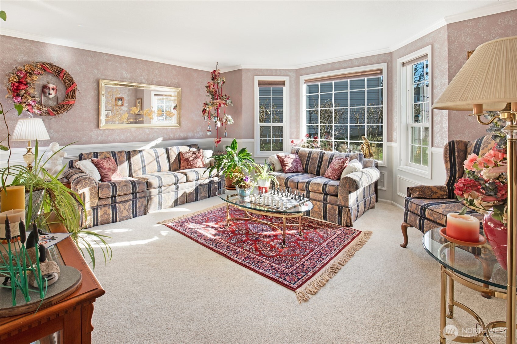 11908 Northeast 168th Street Bothell, WA 98011 - Photo 4 of 30 a living room with furniture and a floor to ceiling window