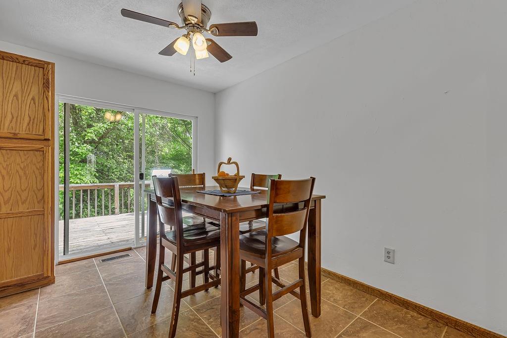 6014 Forest Drive Monaca, PA 15061 - Photo 13 of 32 a view of a dining room with furniture window and outside view