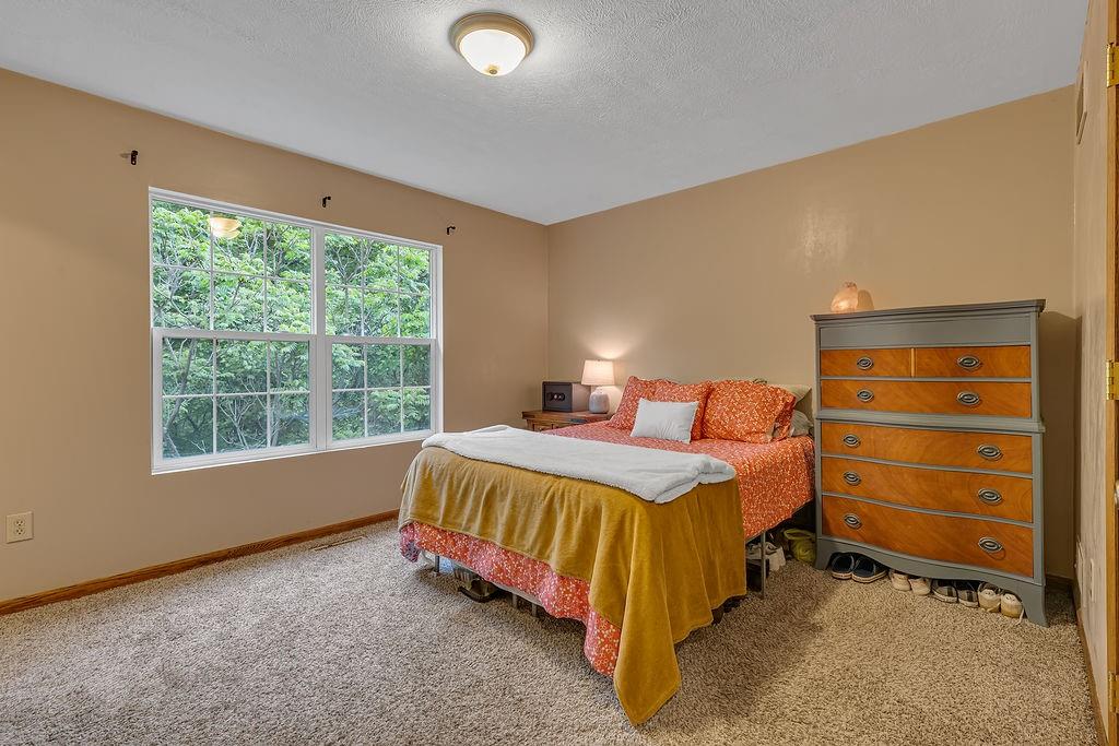 6014 Forest Drive Monaca, PA 15061 - Photo 14 of 32 a bed room with a bed and a window