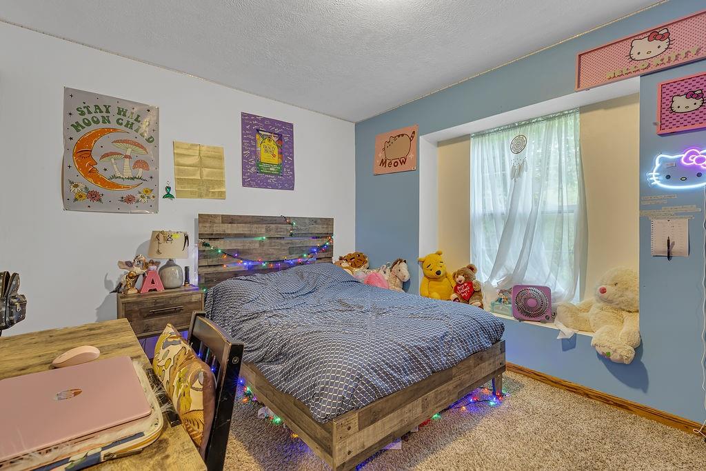 6014 Forest Drive Monaca, PA 15061 - Photo 17 of 32 a bedroom with bed and glass window