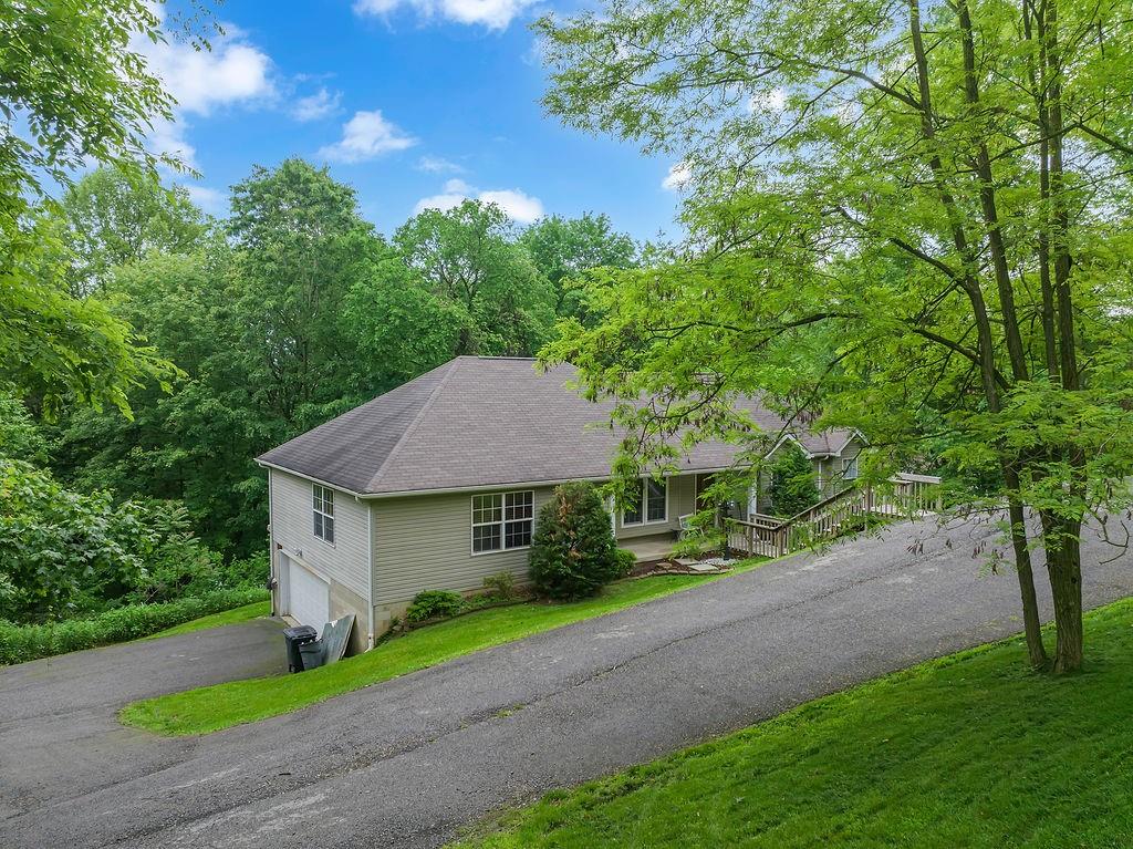 6014 Forest Drive Monaca, PA 15061 - Photo 29 of 32 a front view of a house with a yard and garage