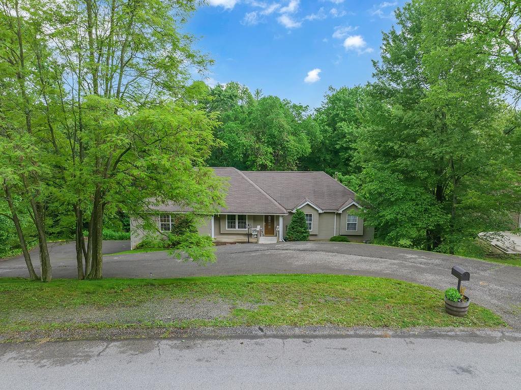 6014 Forest Drive Monaca, PA 15061 - Photo 31 of 32 a front view of a house with a yard