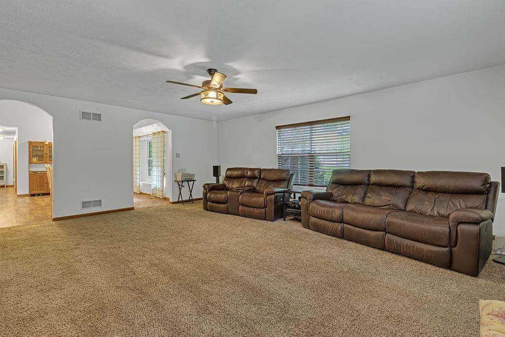6014 Forest Drive Monaca, PA 15061 - Photo 7 of 32 a living room with furniture a couch and chandelier