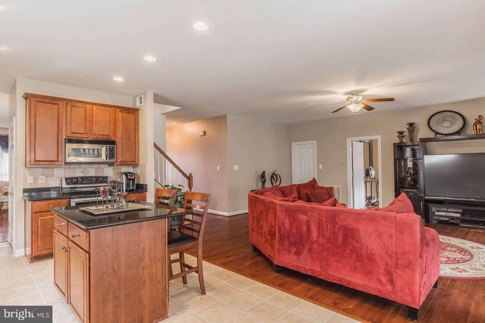4157 Agency Loop Triangle, VA 22172 - Photo 14 of 30 a living room with furniture and a flat screen tv