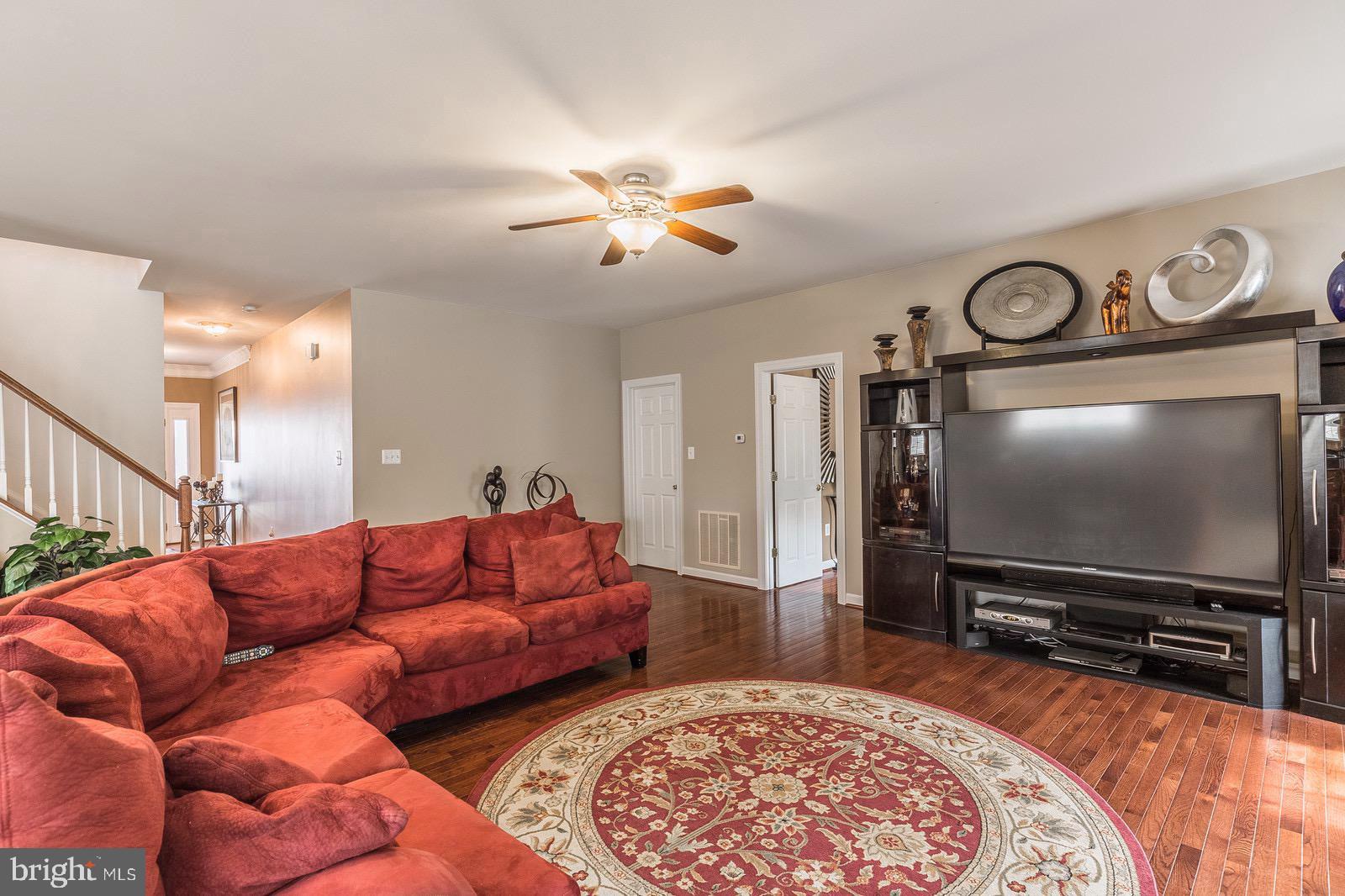 4157 Agency Loop Triangle, VA 22172 - Photo 15 of 30 a living room with furniture and a flat screen tv