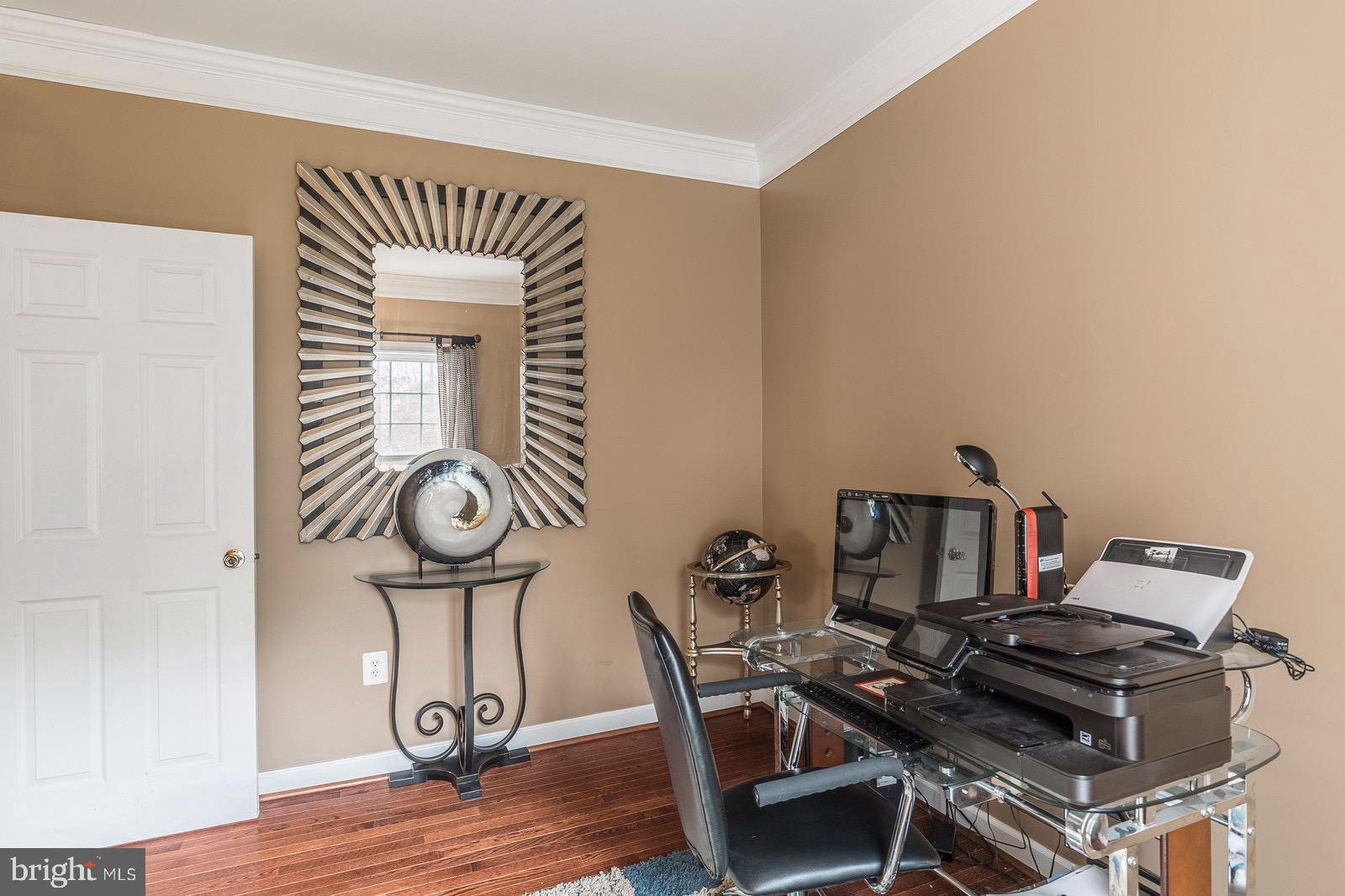 4157 Agency Loop Triangle, VA 22172 - Photo 16 of 30 a workspace with furniture and wooden floor