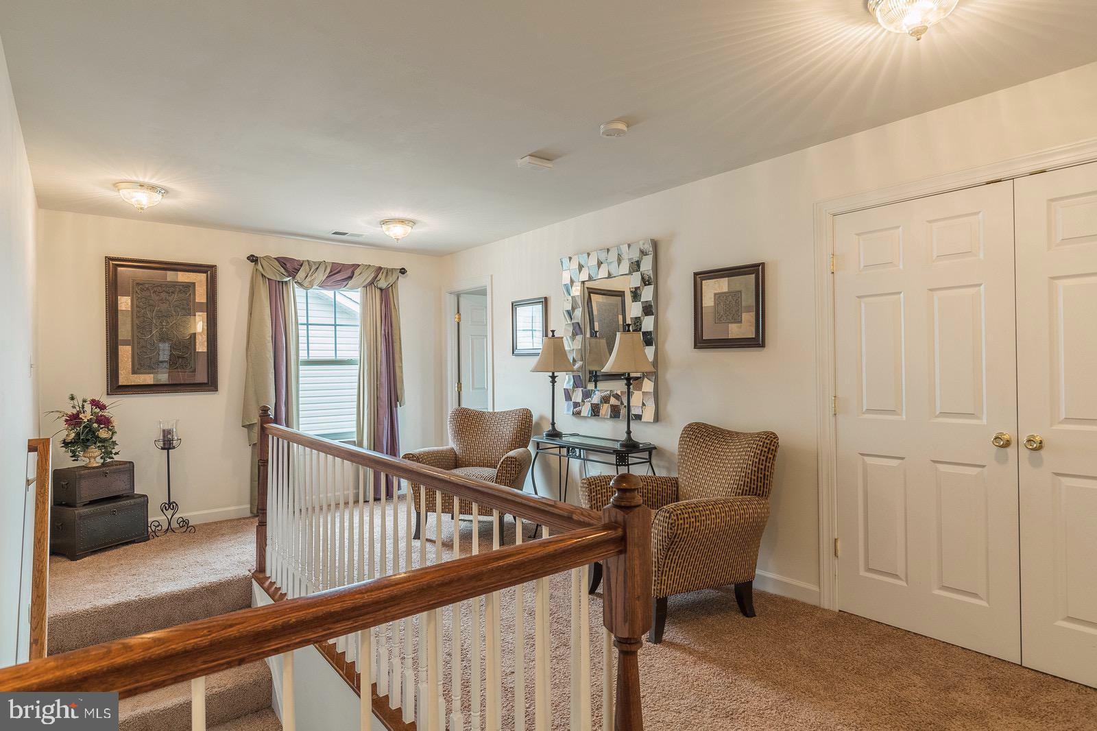 4157 Agency Loop Triangle, VA 22172 - Photo 18 of 30 a living room with furniture and a window