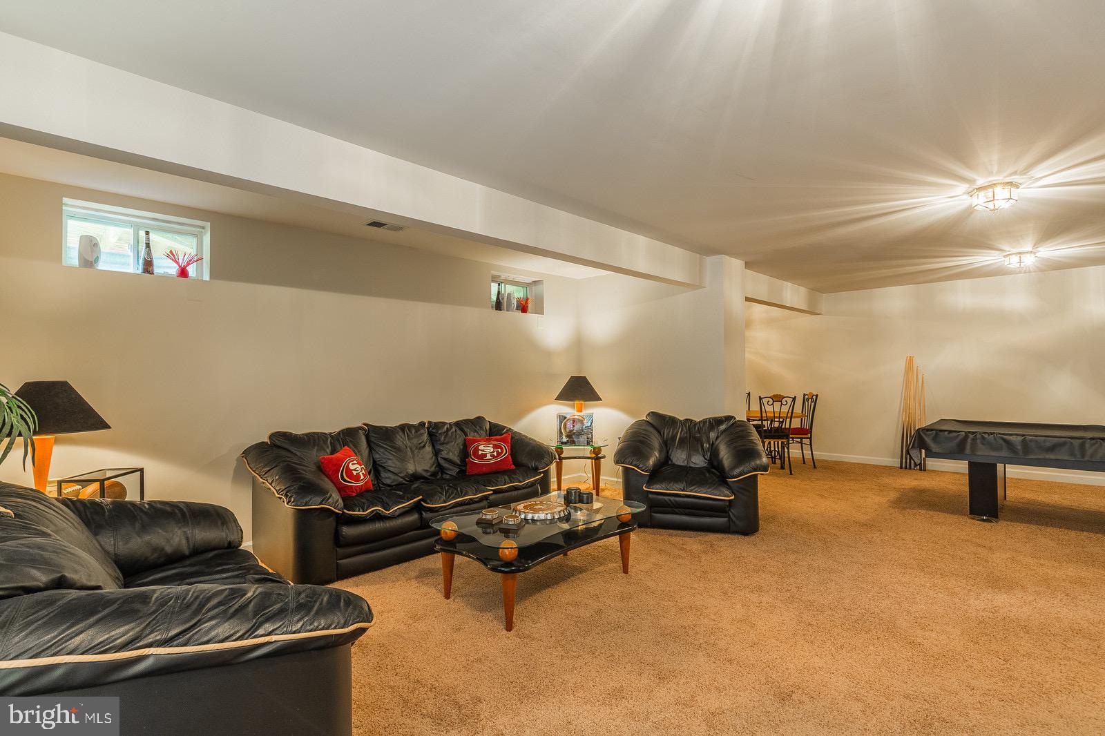 4157 Agency Loop Triangle, VA 22172 - Photo 28 of 30 a living room with furniture and a couch
