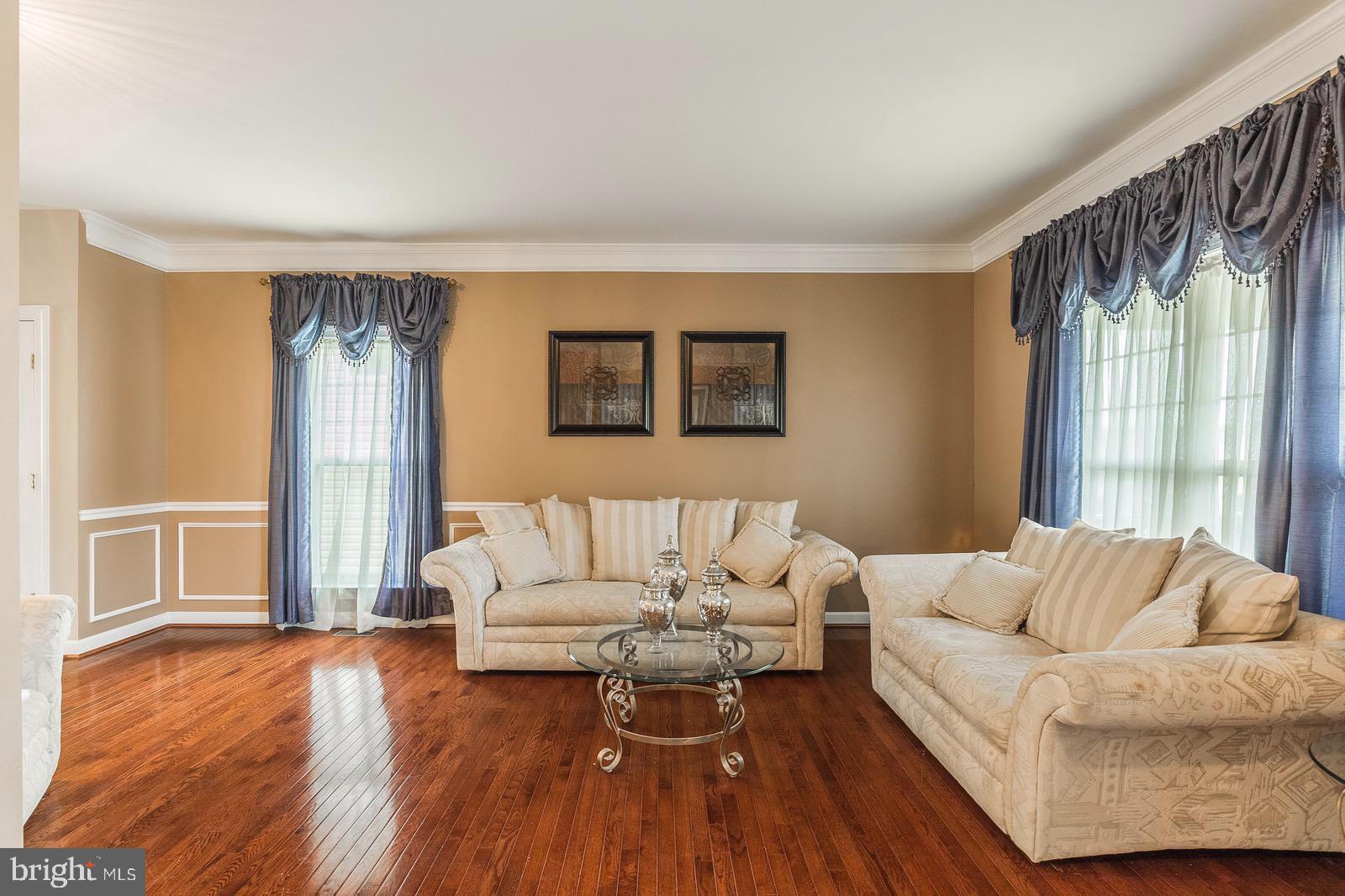 4157 Agency Loop Triangle, VA 22172 - Photo 5 of 30 a living room with furniture and a large window