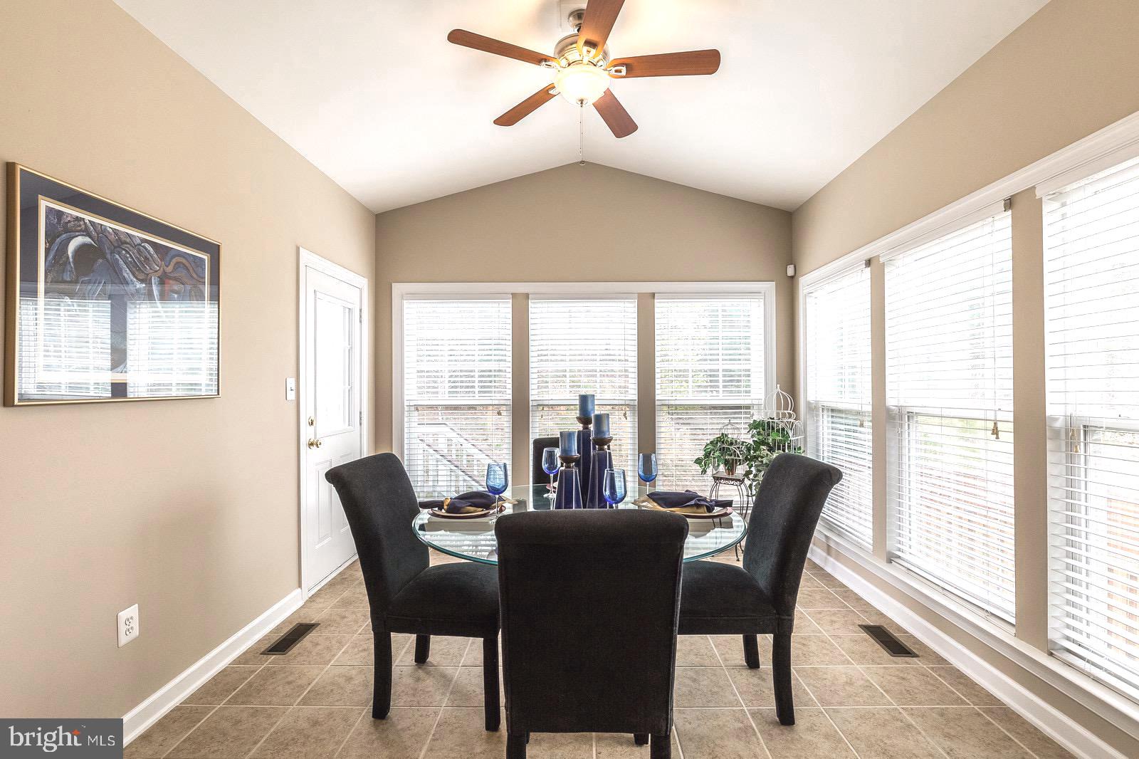 4157 Agency Loop Triangle, VA 22172 - Photo 8 of 30 a view of a dining room with furniture window and outside view