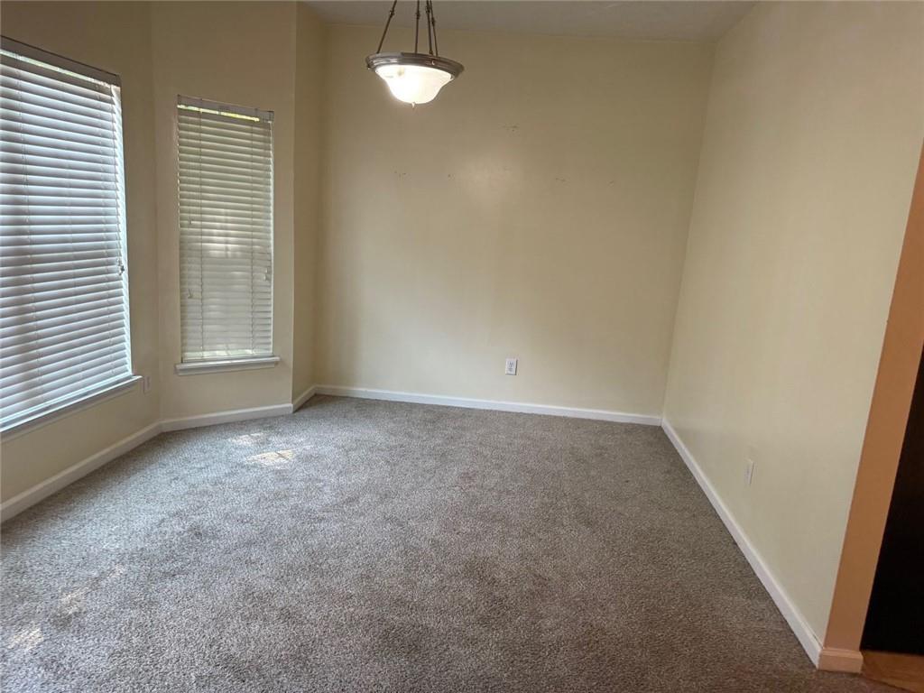 2502 Walden Lake Drive Decatur, GA 30035 - Photo 8 of 8 an empty room with windows