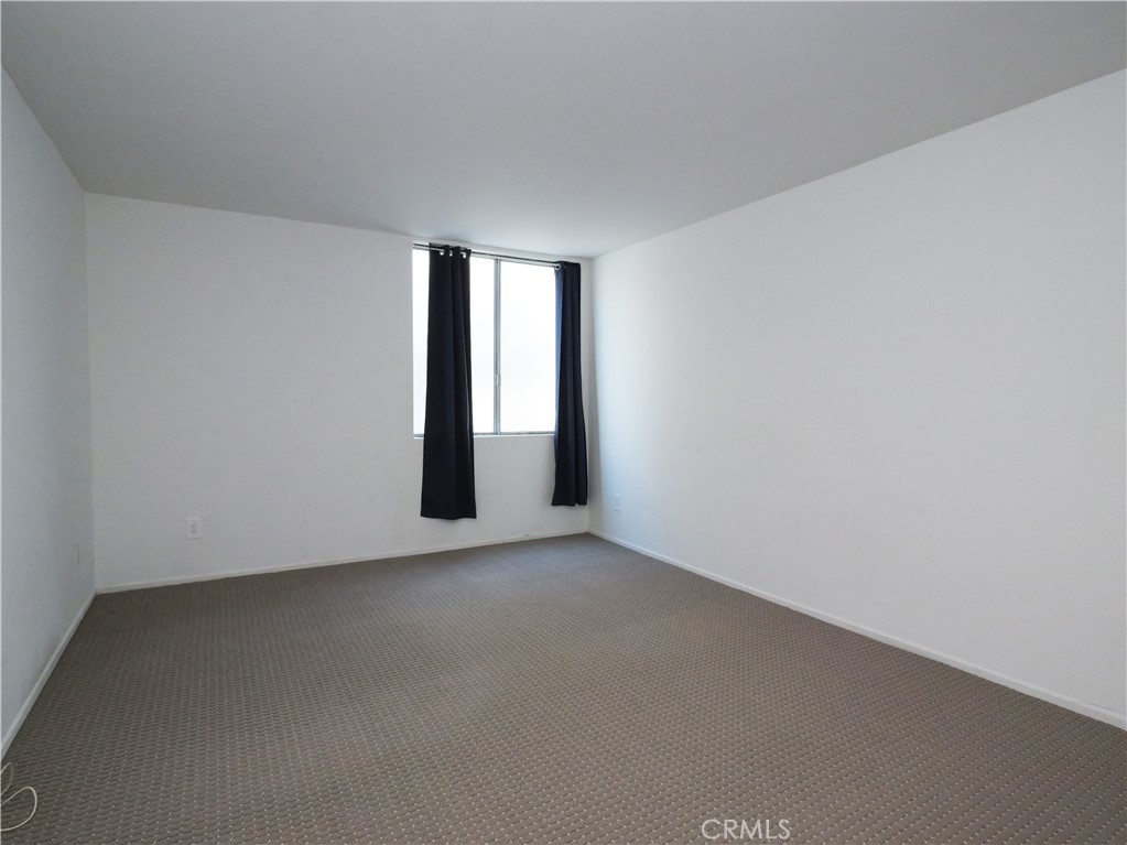 28121 Highridge Road, Unit 311 Rancho Palos Verdes, CA 90275 - Photo 14 of 25 an empty room with windows