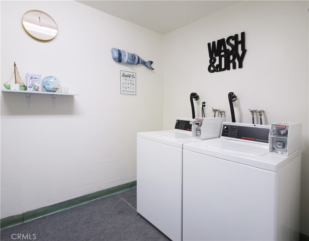 28121 Highridge Road, Unit 311 Rancho Palos Verdes, CA 90275 - Photo 19 of 25 a view of storage and utility room with washer and dryer