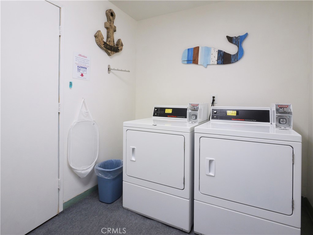 28121 Highridge Road, Unit 311 Rancho Palos Verdes, CA 90275 - Photo 20 of 25 a view of storage and utility room with washer and dryer