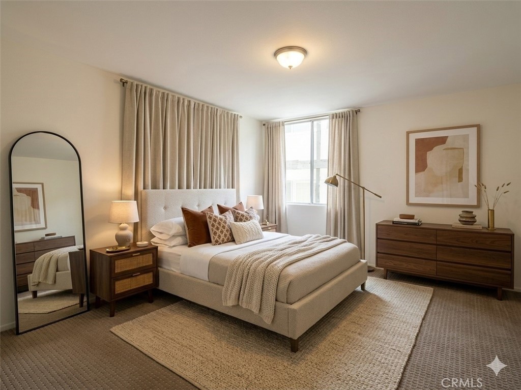 28121 Highridge Road, Unit 311 Rancho Palos Verdes, CA 90275 - Photo 10 of 25 a bedroom with a bed and a dresser