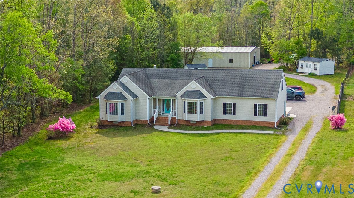 5629 West Quaker Road Disputanta, VA 23842 - Photo 2 of 43 Transitional Ranch with crawl space, a shingled ro
