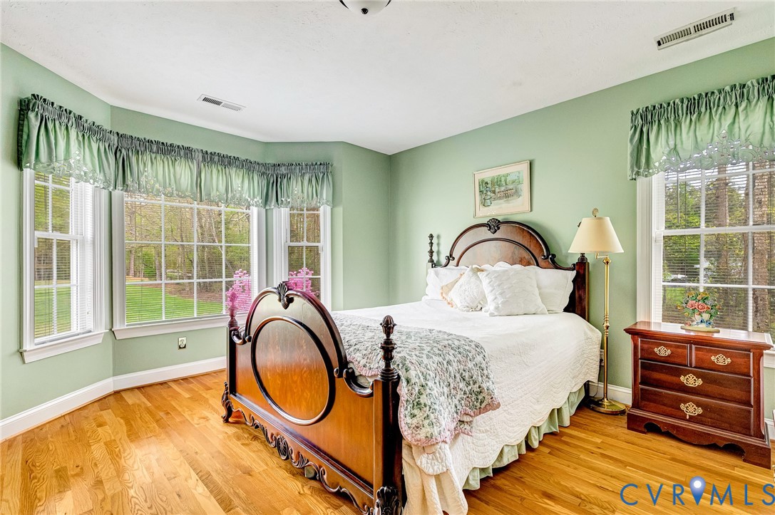 5629 West Quaker Road Disputanta, VA 23842 - Photo 21 of 43 2nd Bedroom Hardwood floors, Bay Window