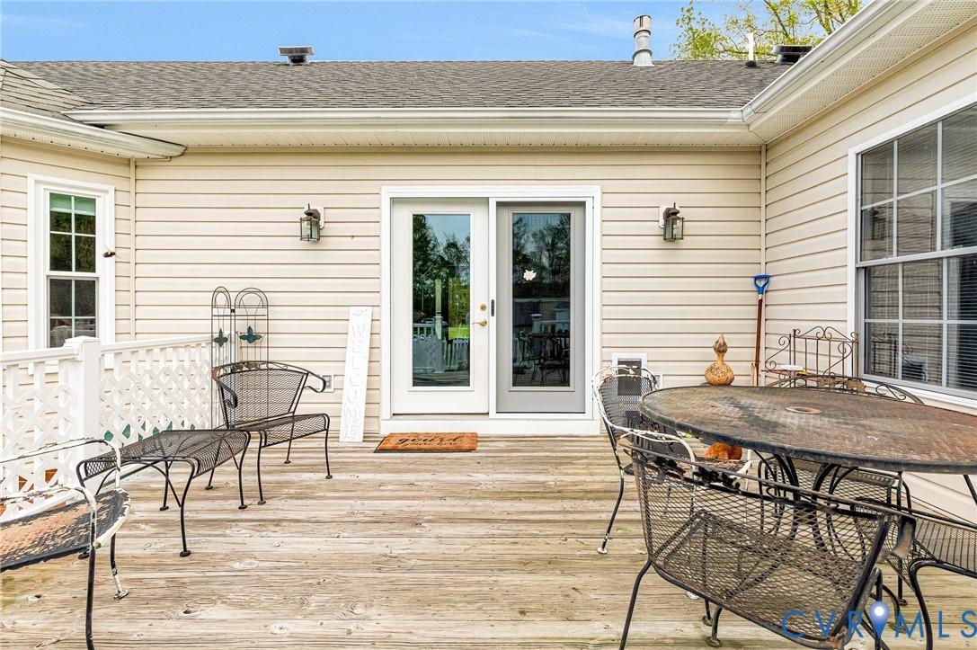 5629 West Quaker Road Disputanta, VA 23842 - Photo 32 of 43 Deck featuring outdoor dining area