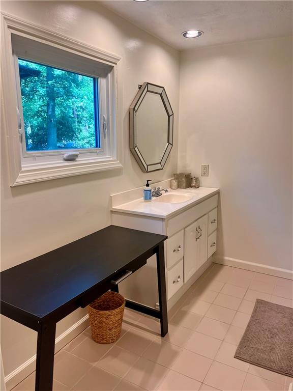 1419 Martin Road Tarentum, PA 15084 - Photo 18 of 31 a room with a sink cabinets and a window