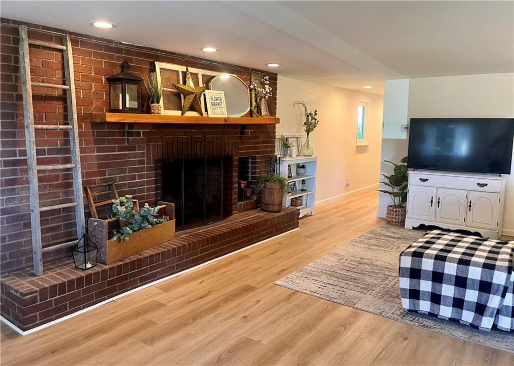 1419 Martin Road Tarentum, PA 15084 - Photo 2 of 31 a living room with fireplace furniture and flat screen tv