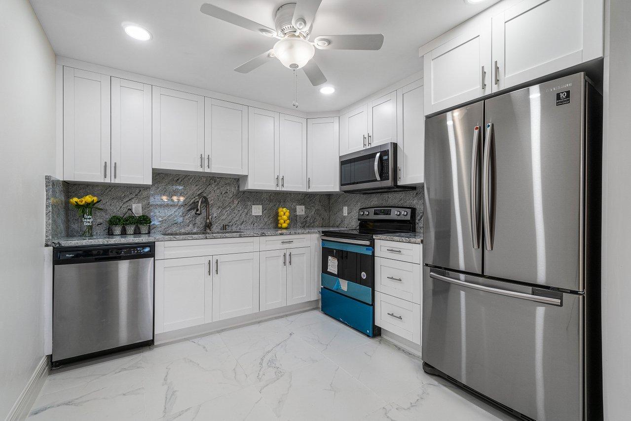 1049 Newcastle A Boca Raton, FL 33434 - Photo 1 of 19 KITCHEN