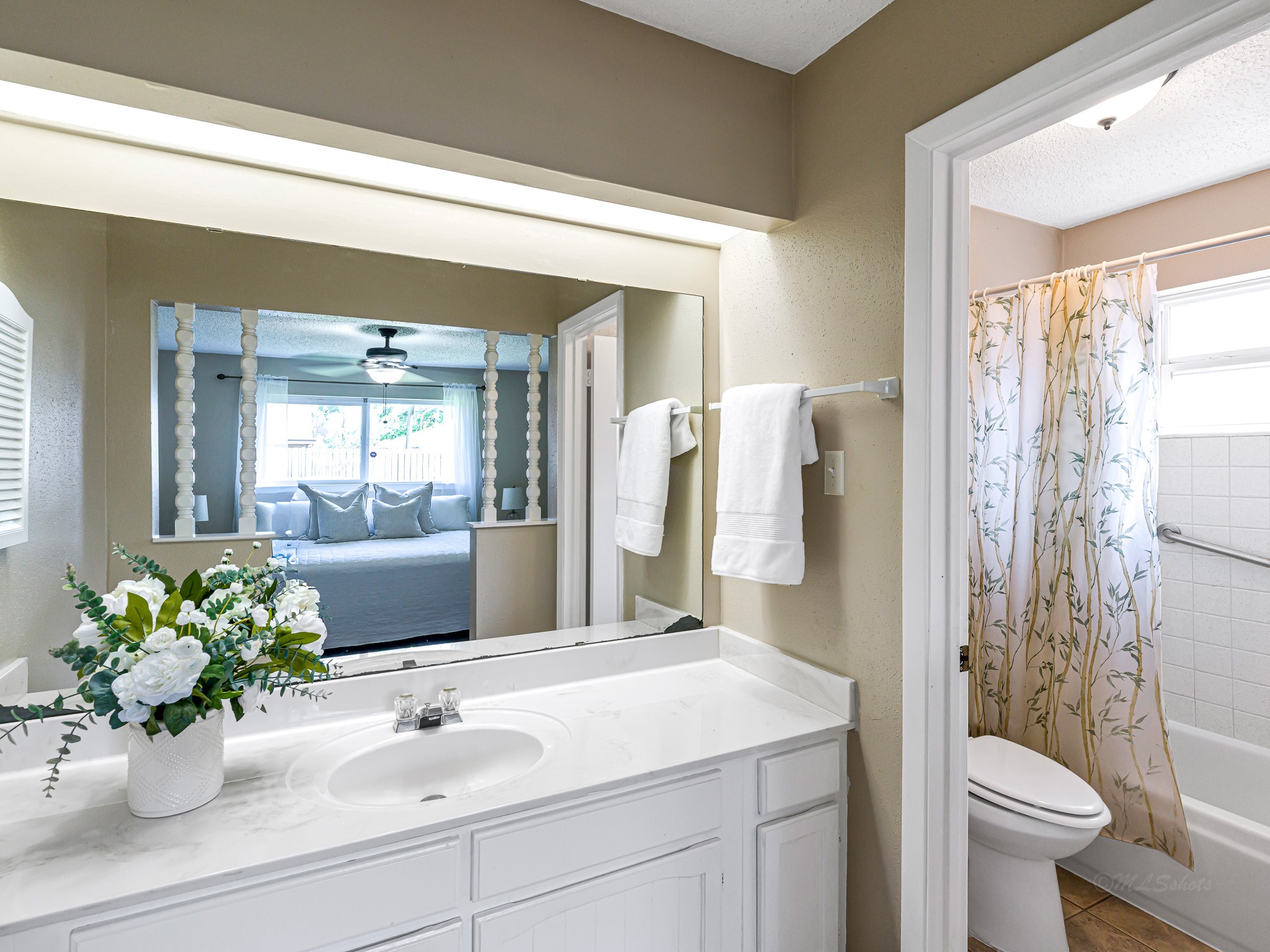 6230 Sunnygate Drive Spring, TX 77373 - Photo 20 of 33 Tub/shower combo and toilet are in a separate room/area.