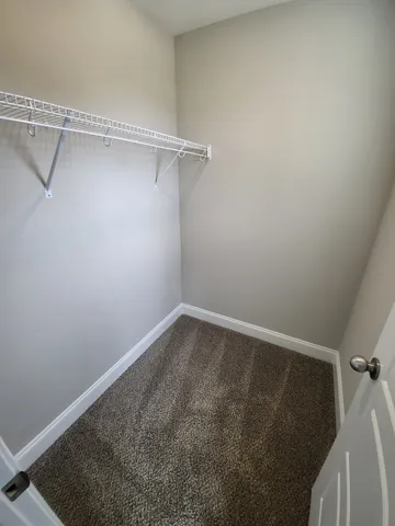 a view of small space with racks on the wall