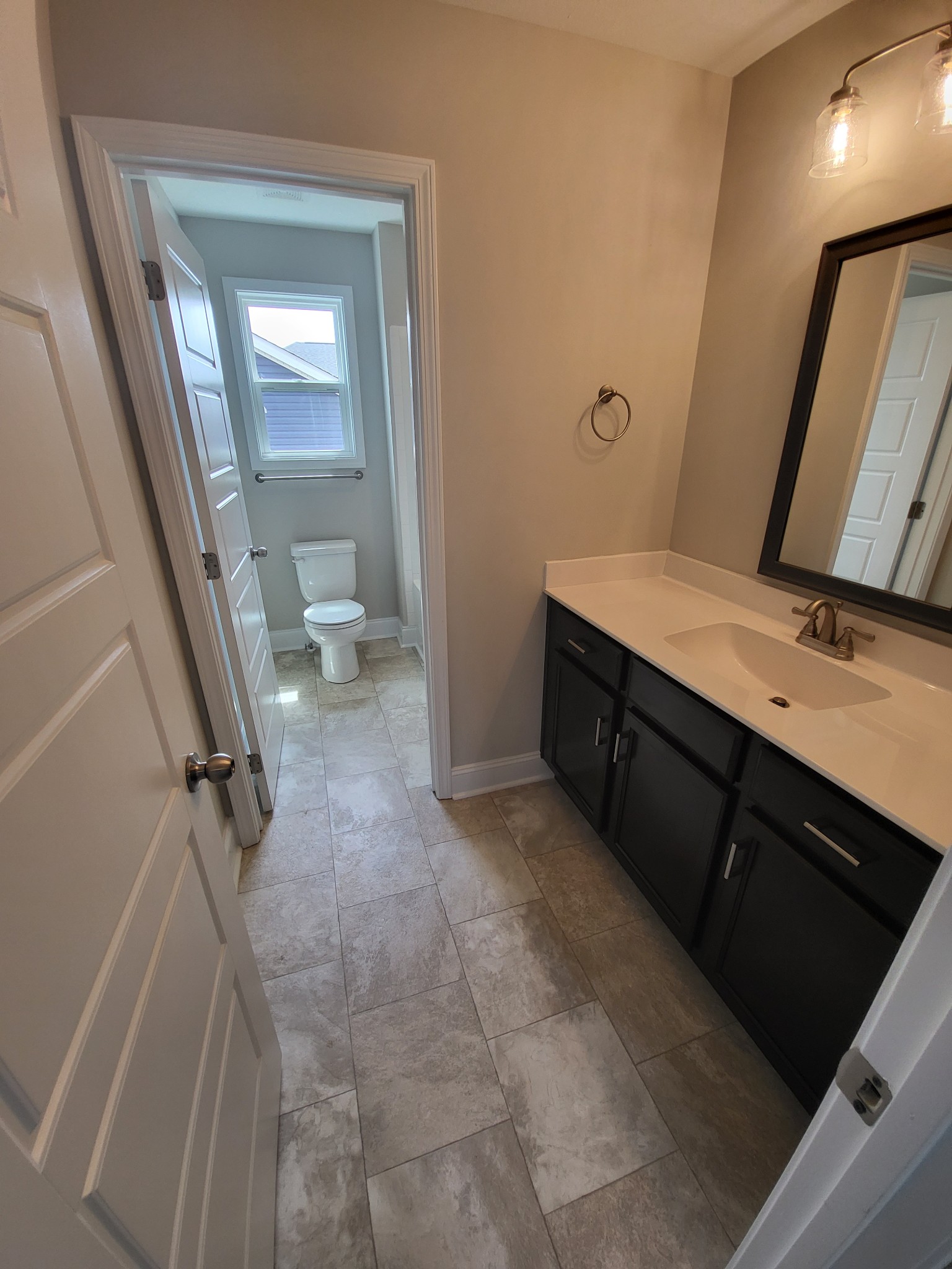201 King Road Clarksville, TN 37042 - Photo 22 of 26 a bathroom with a sink and a mirror