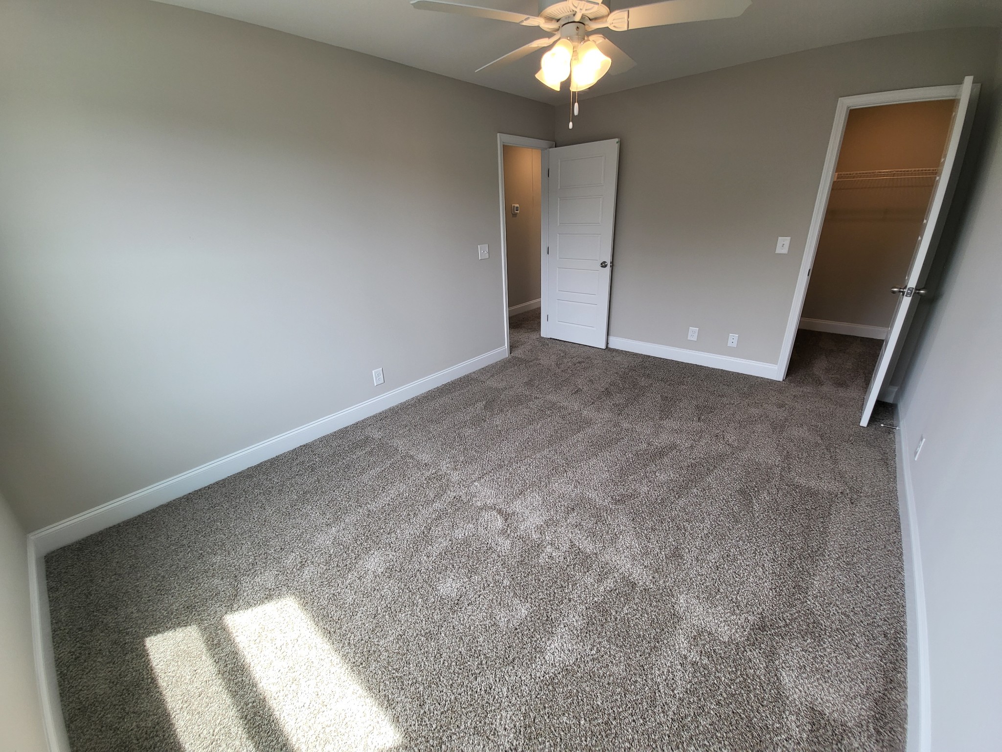 201 King Road Clarksville, TN 37042 - Photo 25 of 26 an empty room with a chandelier fan