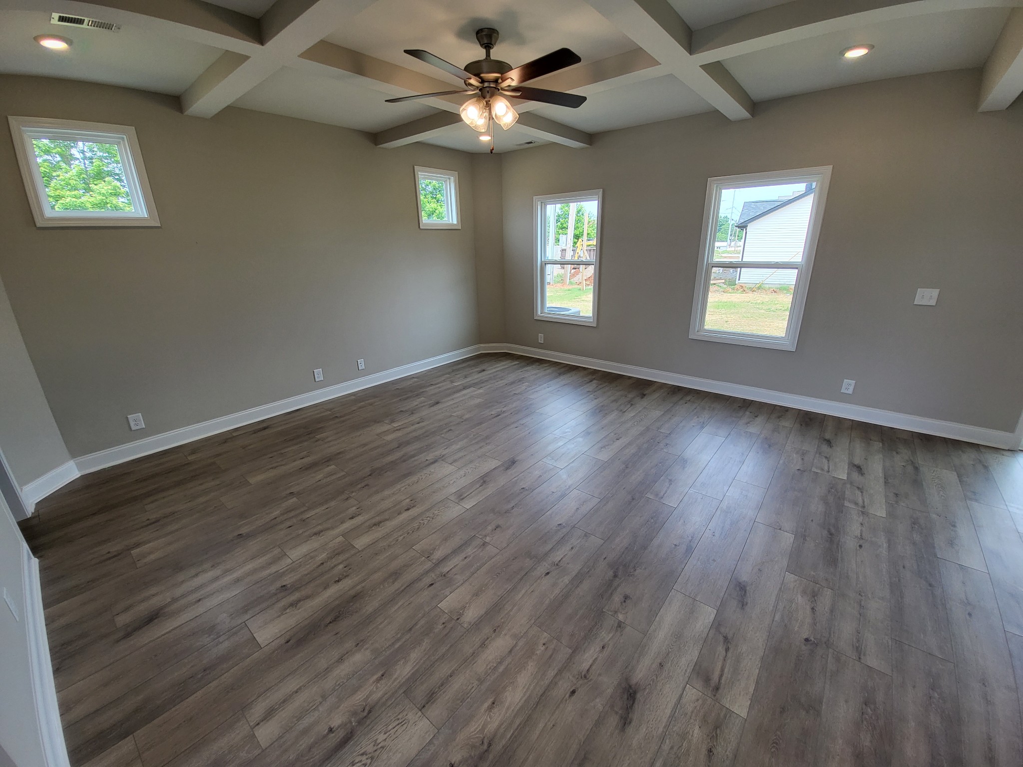 201 King Road Clarksville, TN 37042 - Photo 5 of 26 a view of an empty room with wooden floor and a window
