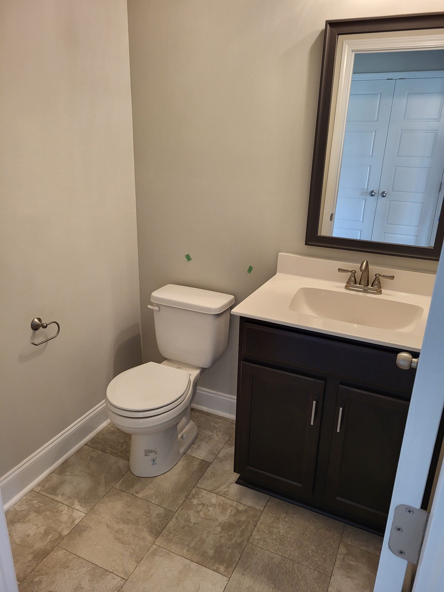 201 King Road Clarksville, TN 37042 - Photo 10 of 26 a bathroom with a toilet sink and mirror