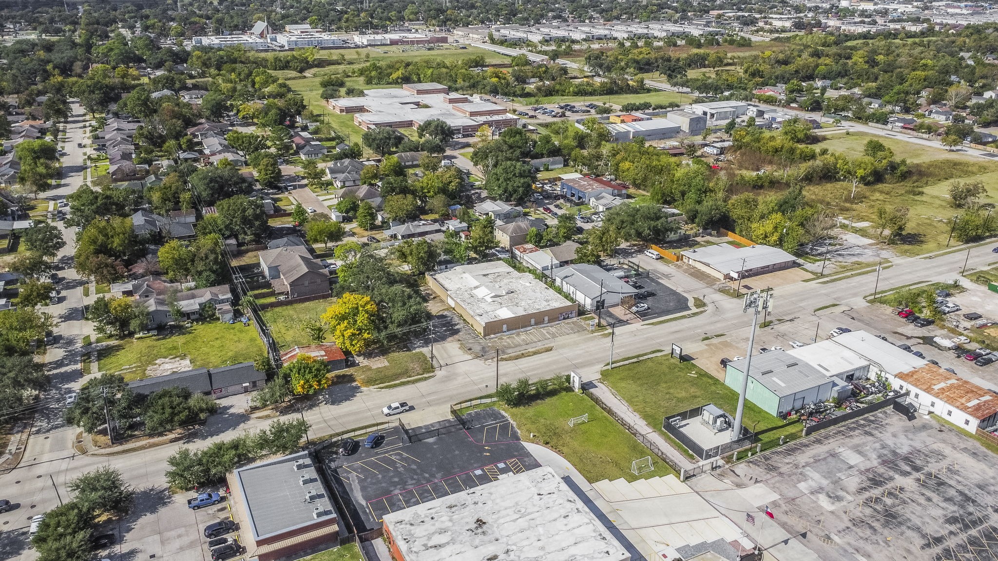 1018 Shaver Street Pasadena, TX 77506 - Photo 32 of 43 Aerial perspective highlighting proximity to nearby commercial, residential, and school zones.