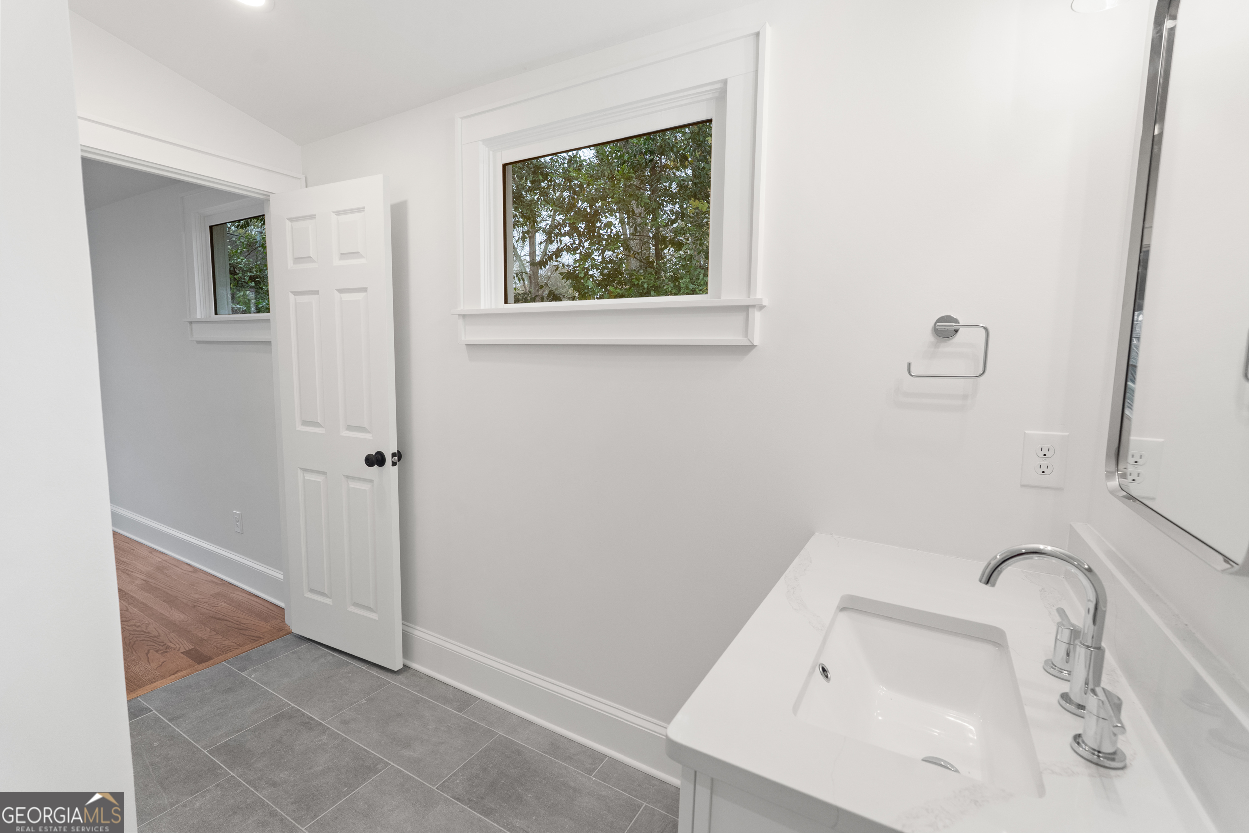 265 Springdale Street Athens, GA 30606 - Photo 30 of 43 a bathroom with a sink and vanity