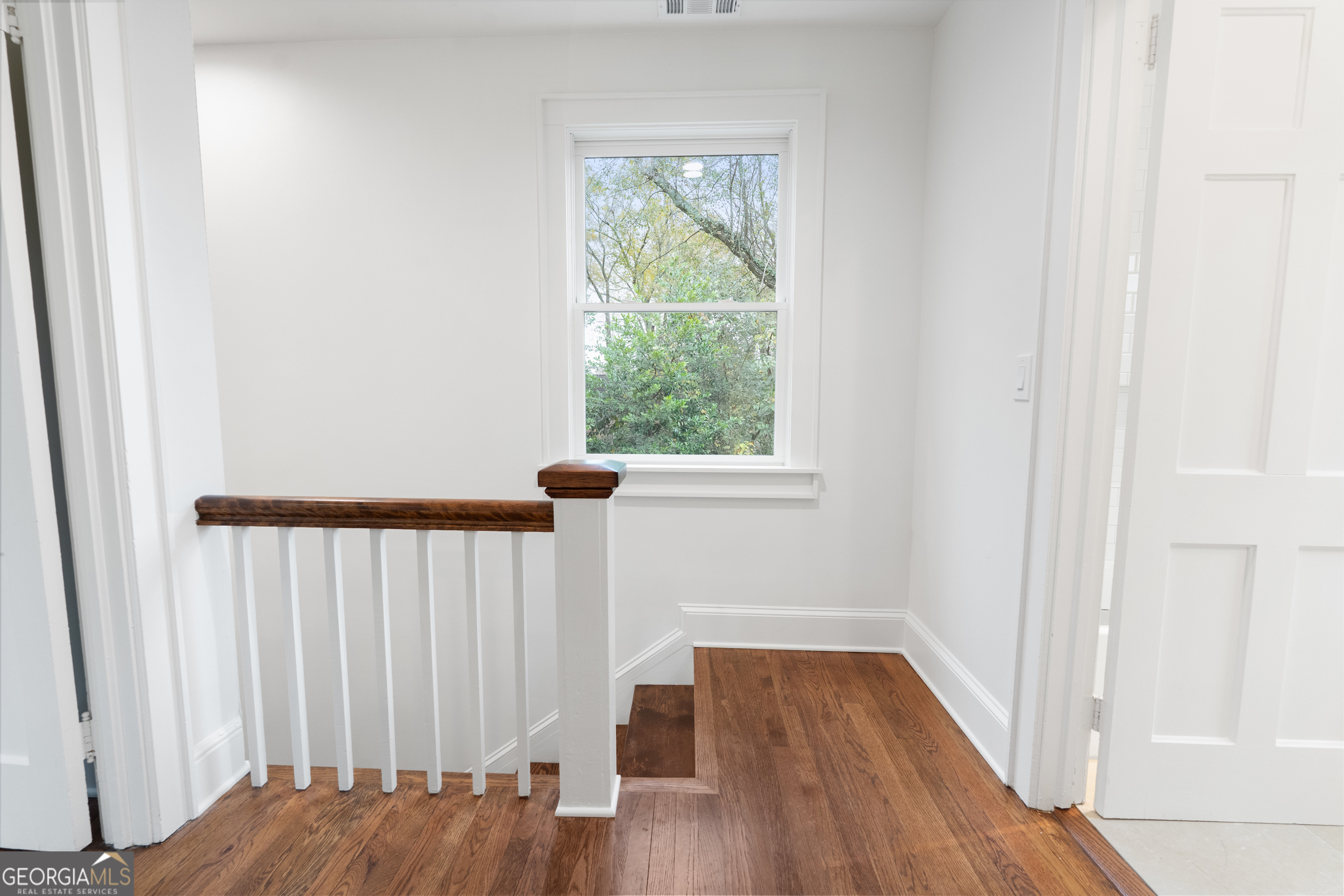 265 Springdale Street Athens, GA 30606 - Photo 31 of 43 a view of balcony with wooden floor
