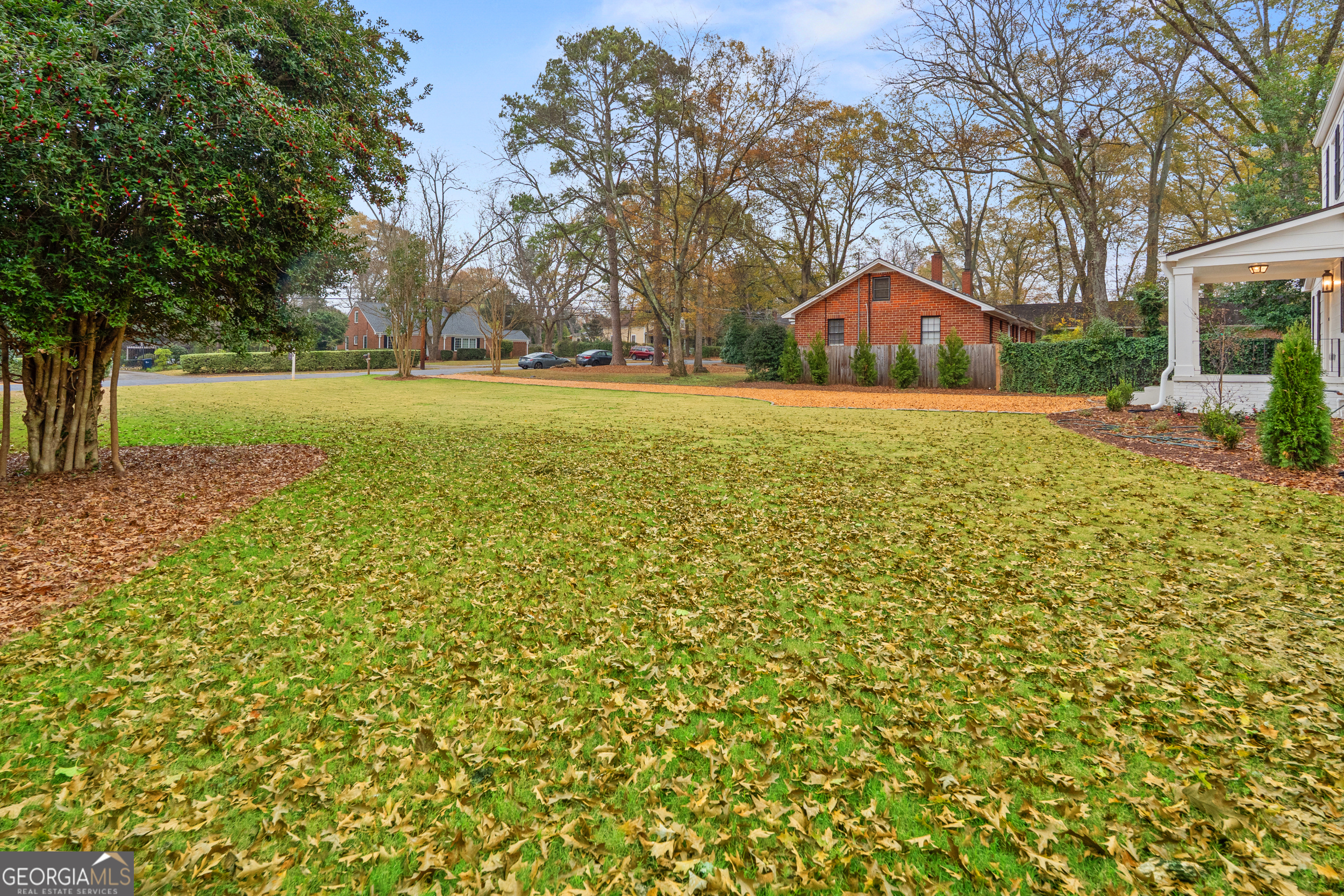 265 Springdale Street Athens, GA 30606 - Photo 37 of 43 a view of outdoor space with garden and trees