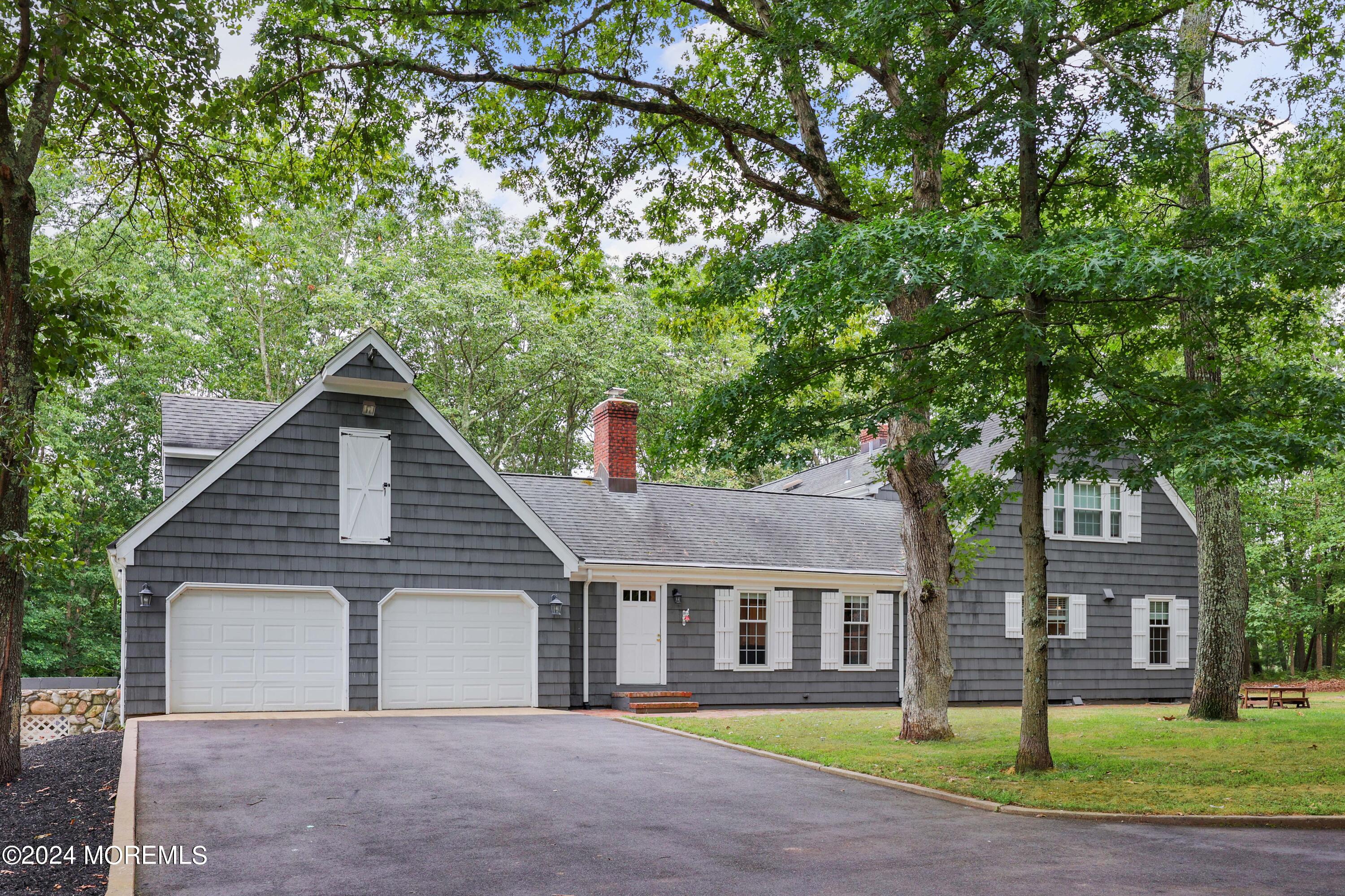 211 Georgia Road Freehold, NJ 07728 - Photo 1 of 41 a view of a house with a backyard
