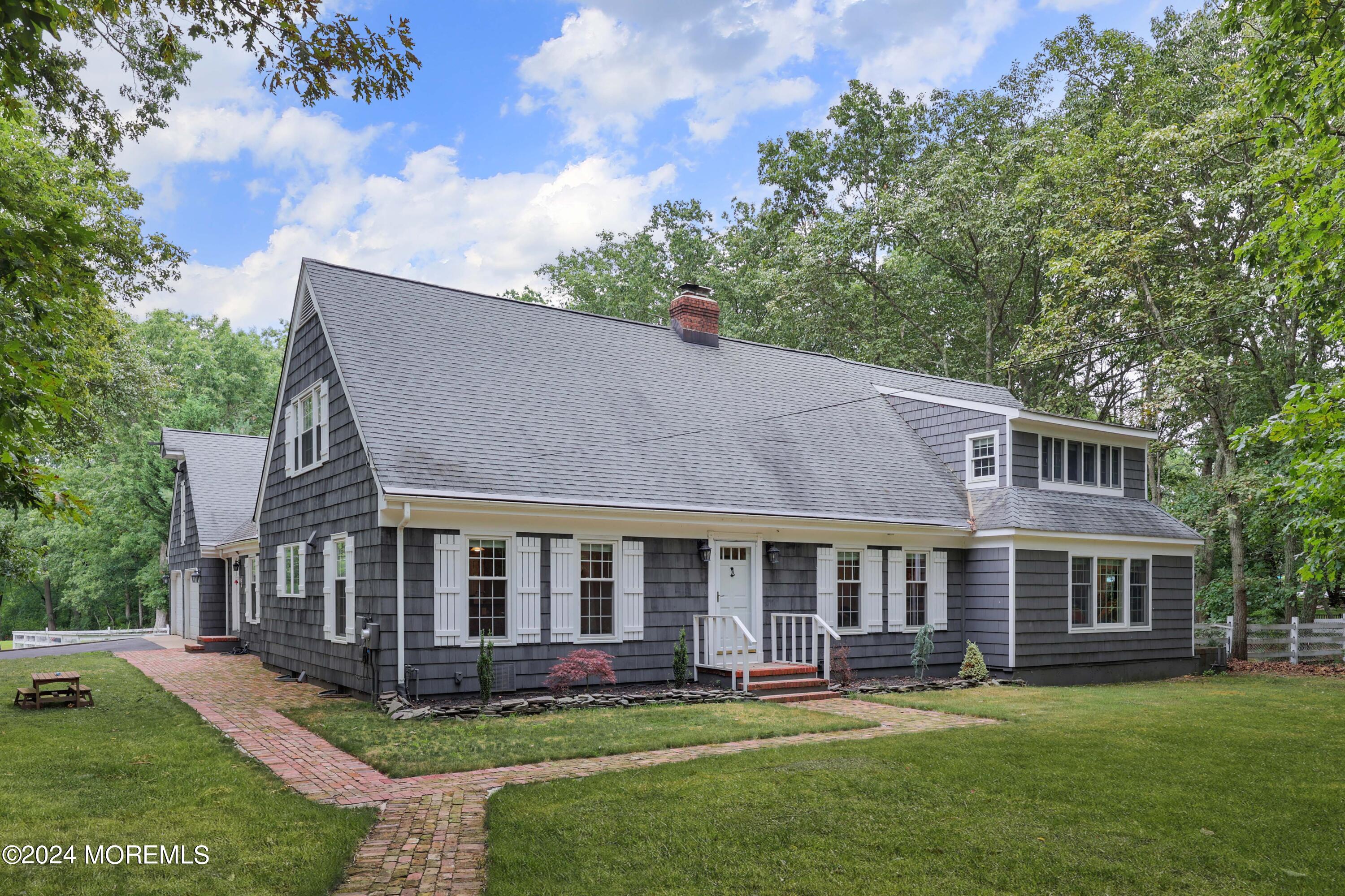 211 Georgia Road Freehold, NJ 07728 - Photo 2 of 41 front view of a house with a yard