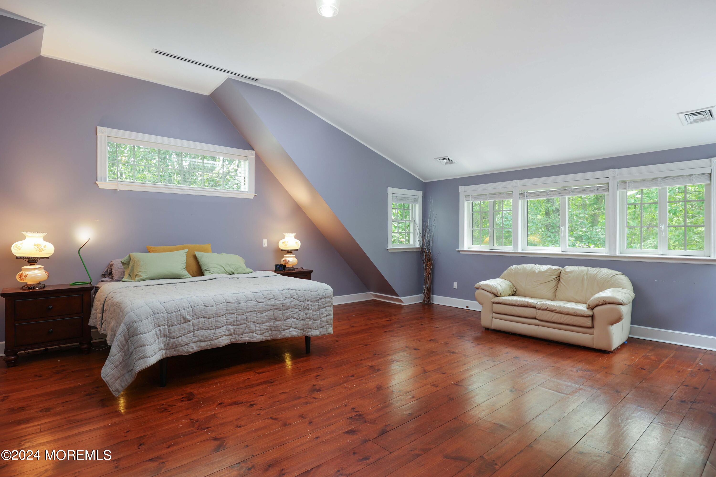 211 Georgia Road Freehold, NJ 07728 - Photo 26 of 41 a bedroom with a bed and a window