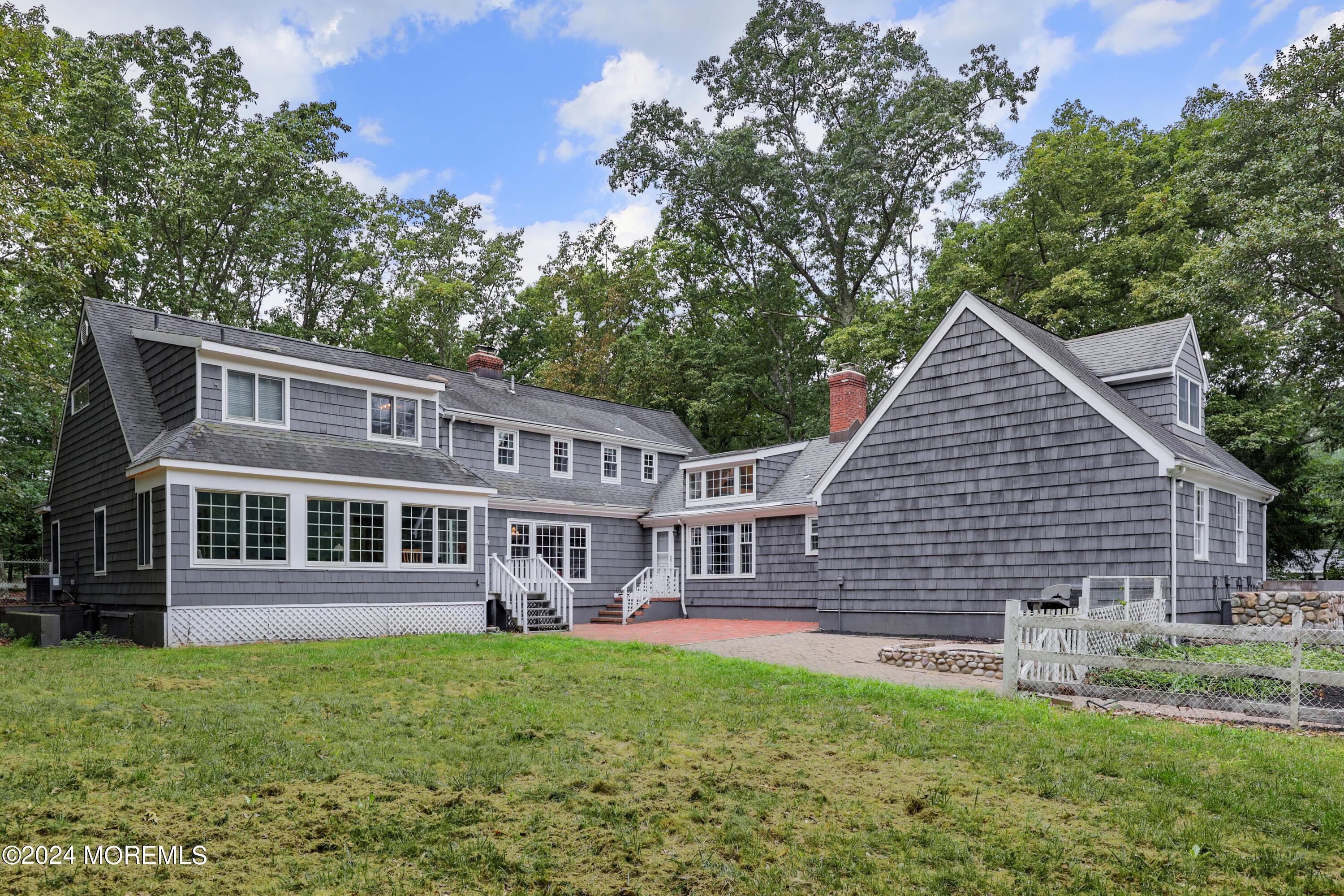 211 Georgia Road Freehold, NJ 07728 - Photo 6 of 41 a view of a house with a yard