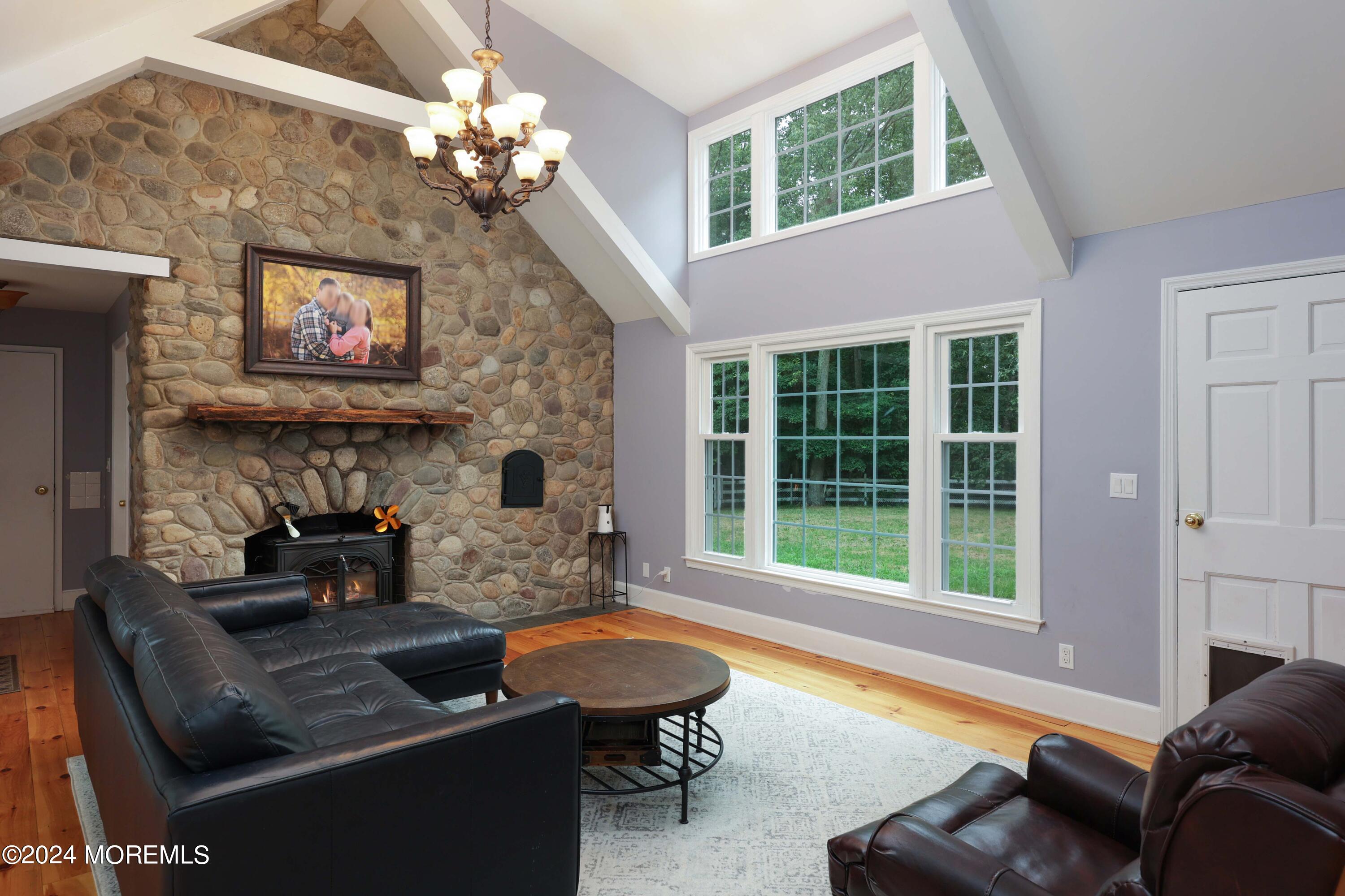 211 Georgia Road Freehold, NJ 07728 - Photo 9 of 41 a living room with furniture and a large window