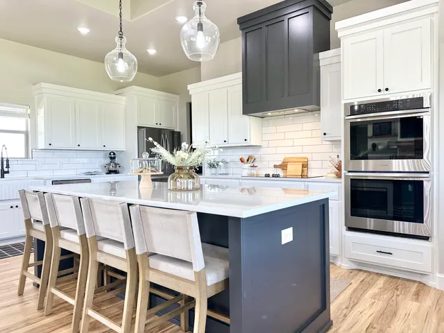 a view of kitchen and dining room with wooden floor