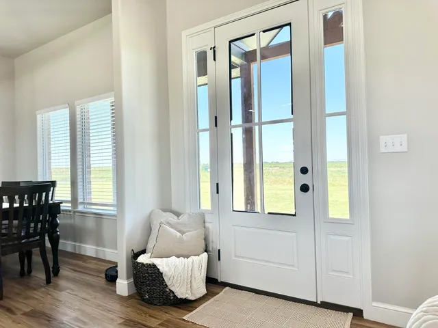 a spacious bathroom with a double vanity sink and a mirror