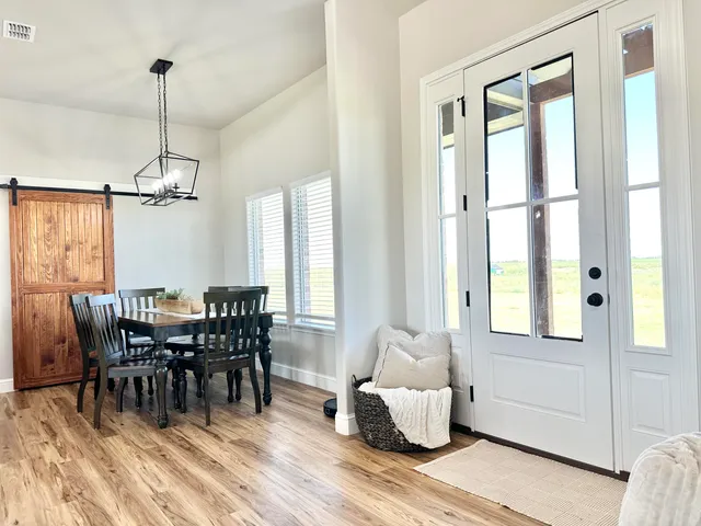 a bathroom with a double vanity sink mirror and