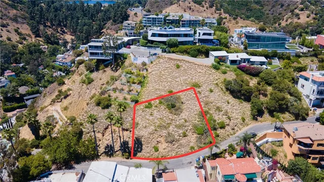 an aerial view of a houses with outdoor space