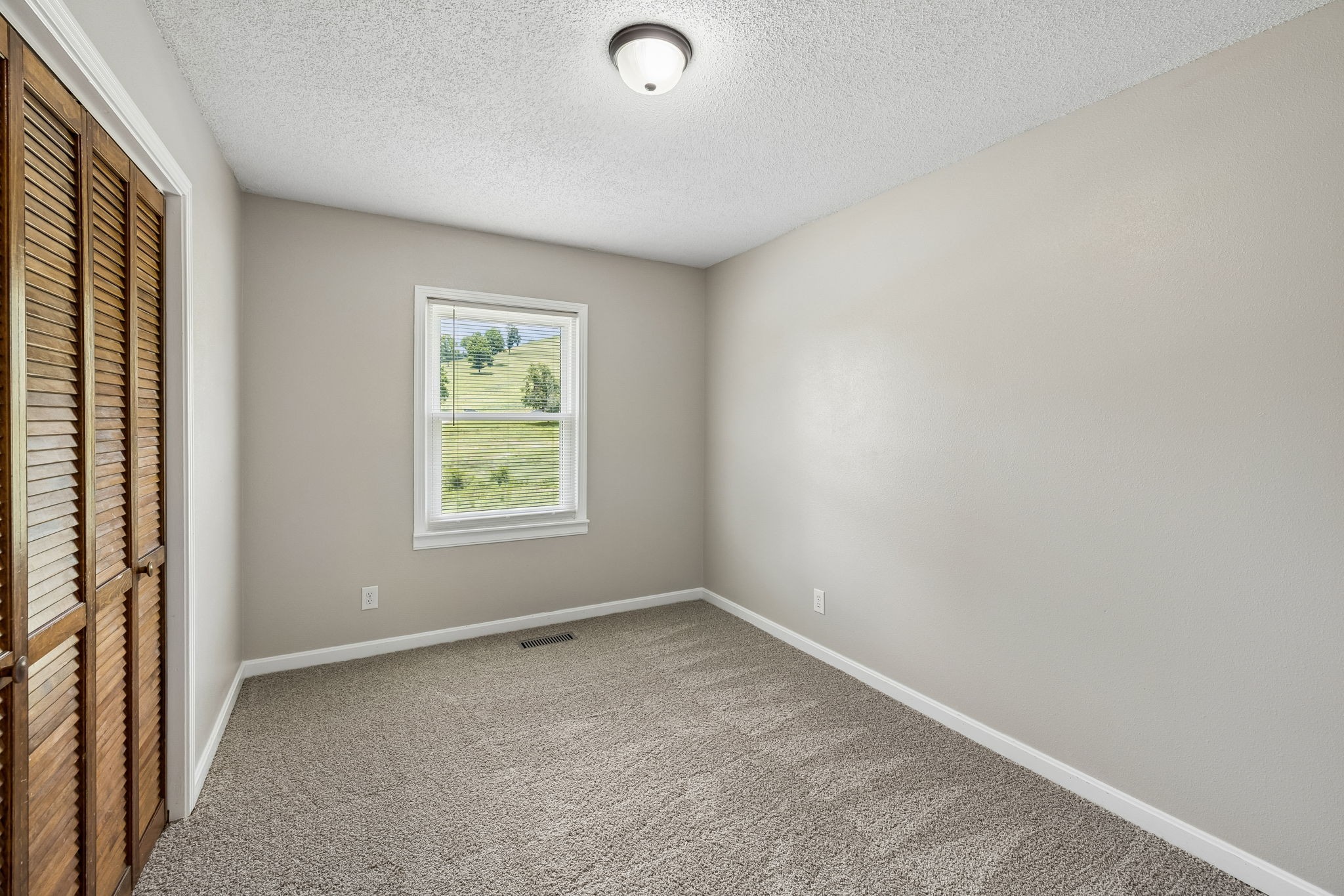 14 Morris Lane Carthage, TN 37030 - Photo 24 of 31 an empty room with windows