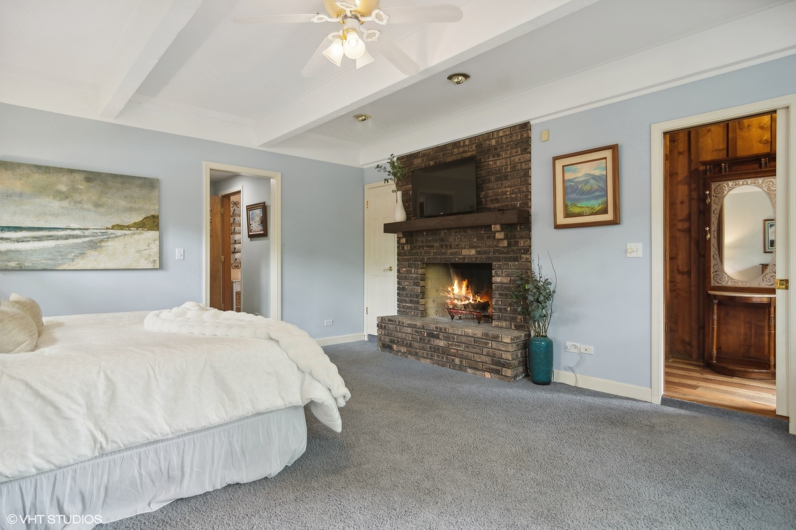 3524 West Long Grove Road Long Grove, IL 60047 - Photo 17 of 53 a bedroom with a bed and a fireplace