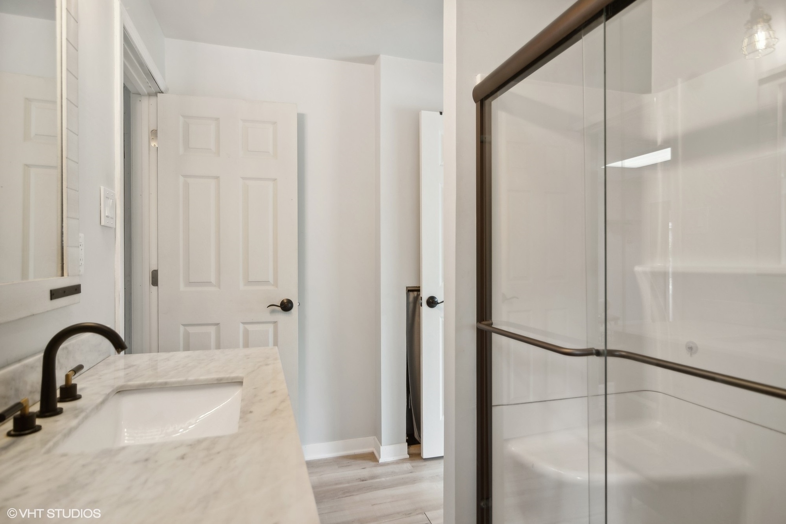 3524 West Long Grove Road Long Grove, IL 60047 - Photo 45 of 53 a bathroom with a sink and a mirror