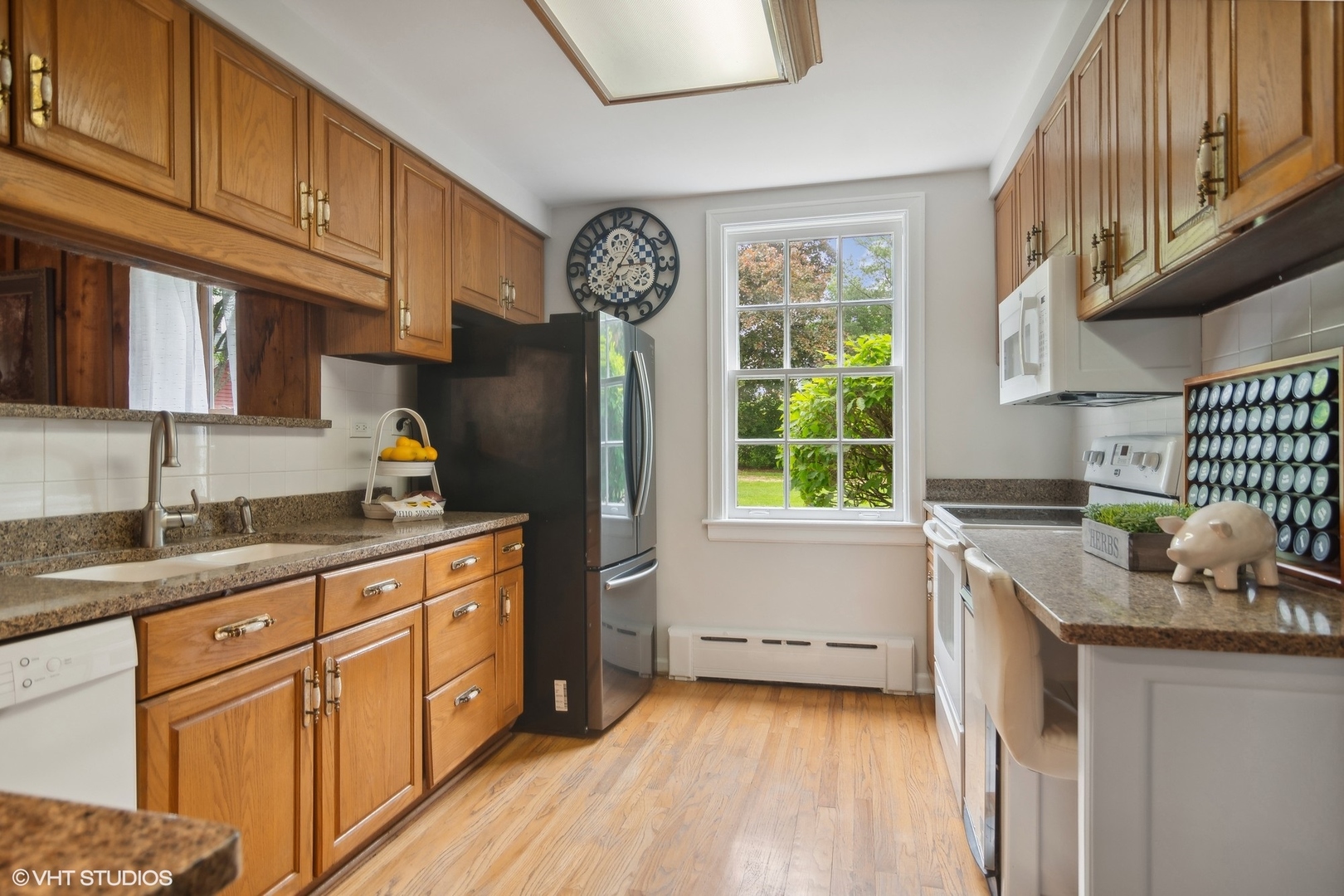 3524 West Long Grove Road Long Grove, IL 60047 - Photo 8 of 53 a kitchen with granite countertop a sink cabinets stainless steel appliances and a window