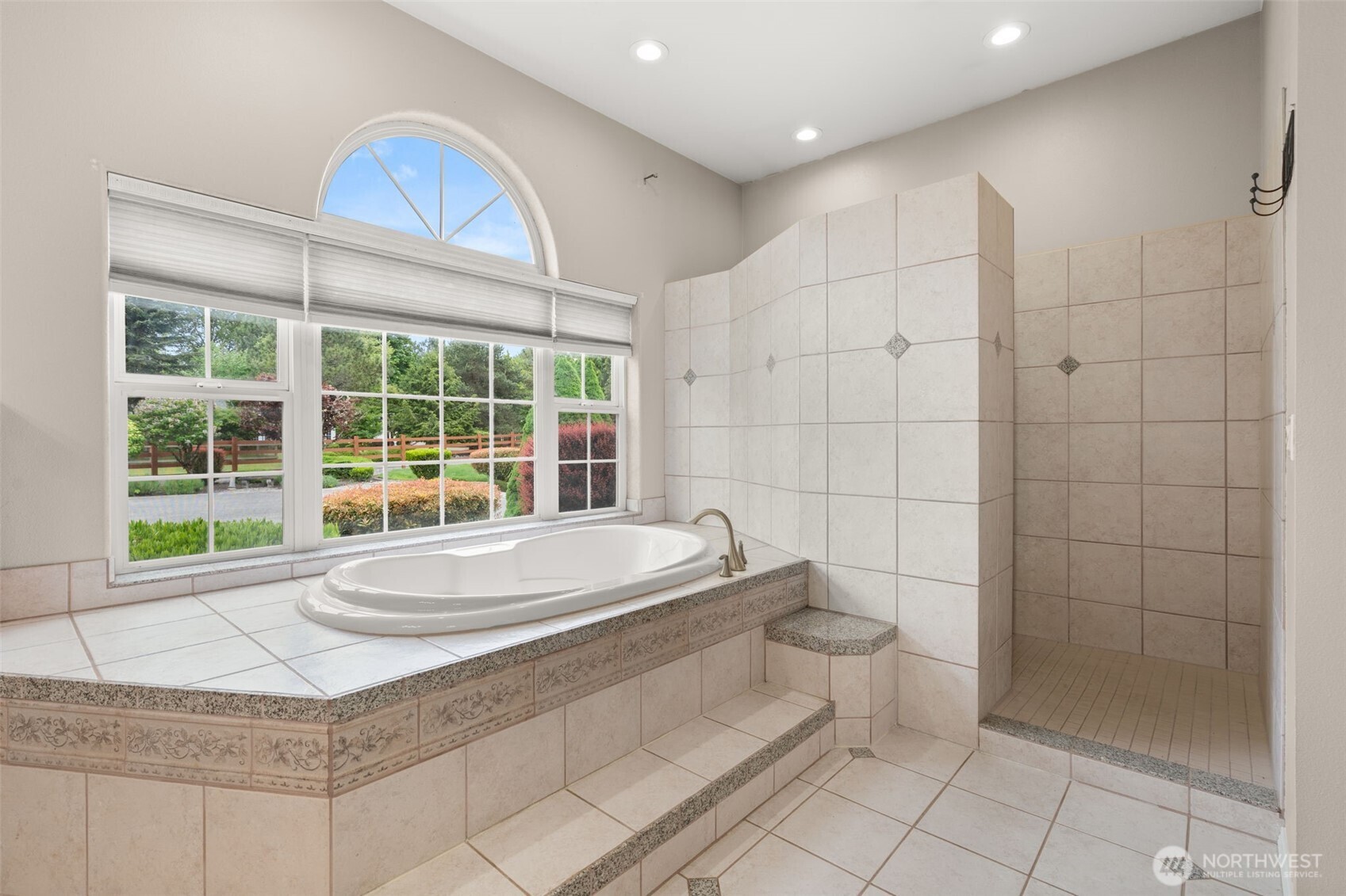 9609 346th Street South Roy, WA 98580 - Photo 16 of 37 a bathroom with a sink a toilet and shower
