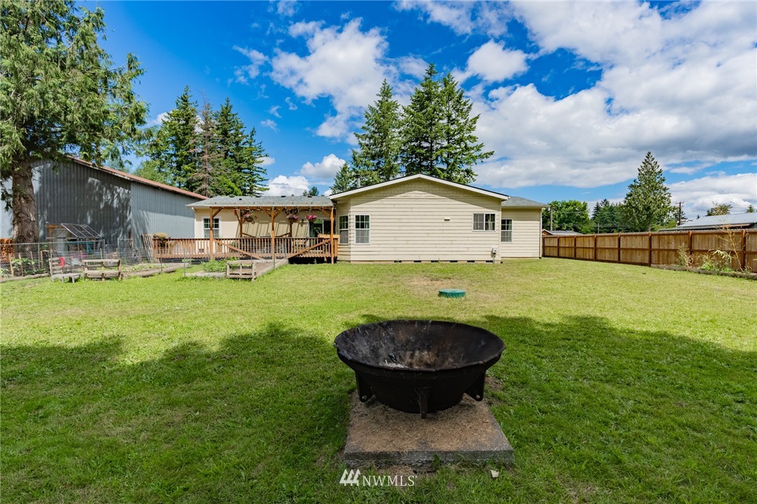 2065 East Pole Road Everson, WA 98247 - Photo 34 of 40 a view of a house with a yard